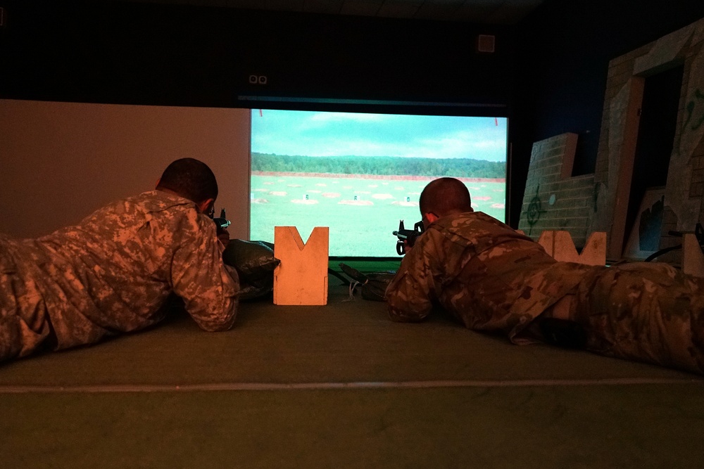 Vicenza Military Intelligence Detachment engage targets at the Engagement Skills Trainer (EST), Caserma Ederle, Vicenza