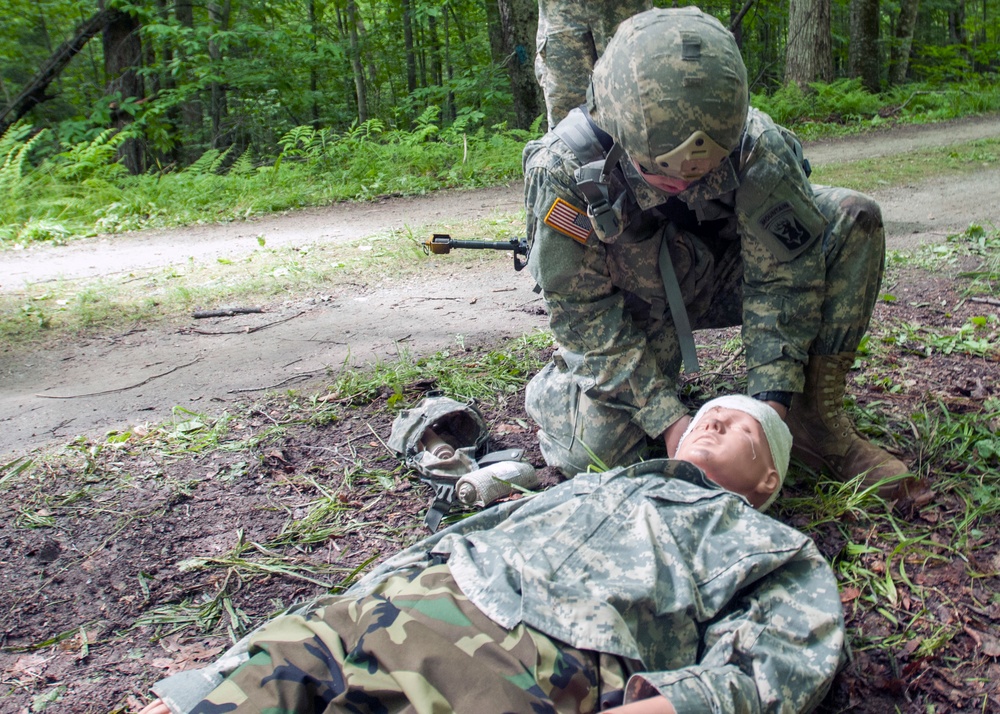 Soldier Wraps Bandages Around Training Dummy's Head