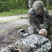 Soldier Wraps Bandages Around Training Dummy's Head