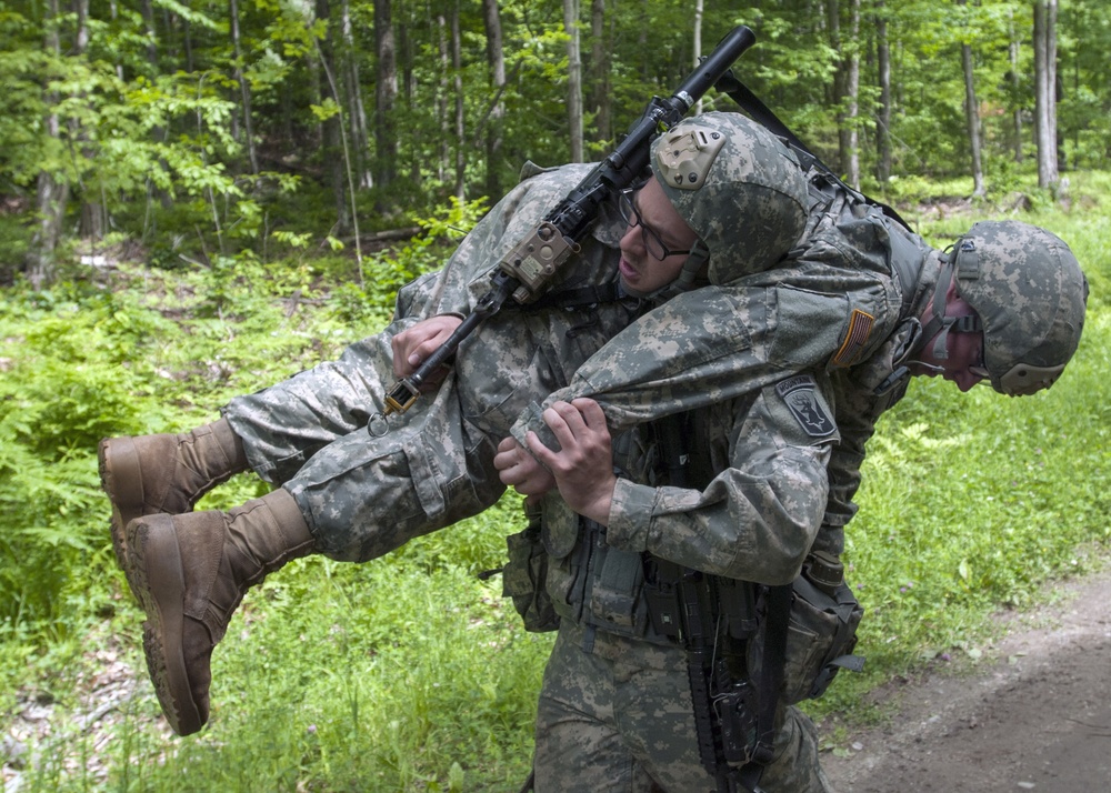 Soldier Fireman Carries Battle Buddy