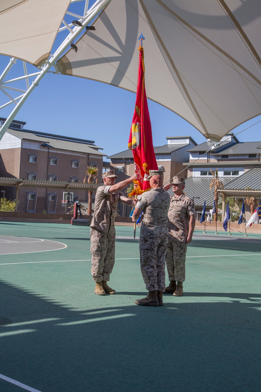 MCLOG commander passes guidon