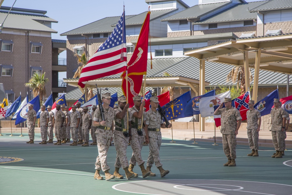 MCLOG commander passes guidon