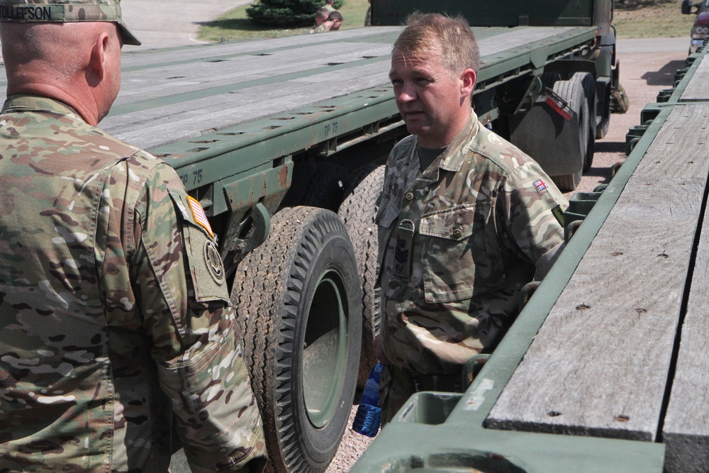 Scottish Soldiers drive American trucks
