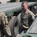 Scottish Soldiers drive American trucks