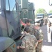 Scottish Soldiers drive American trucks