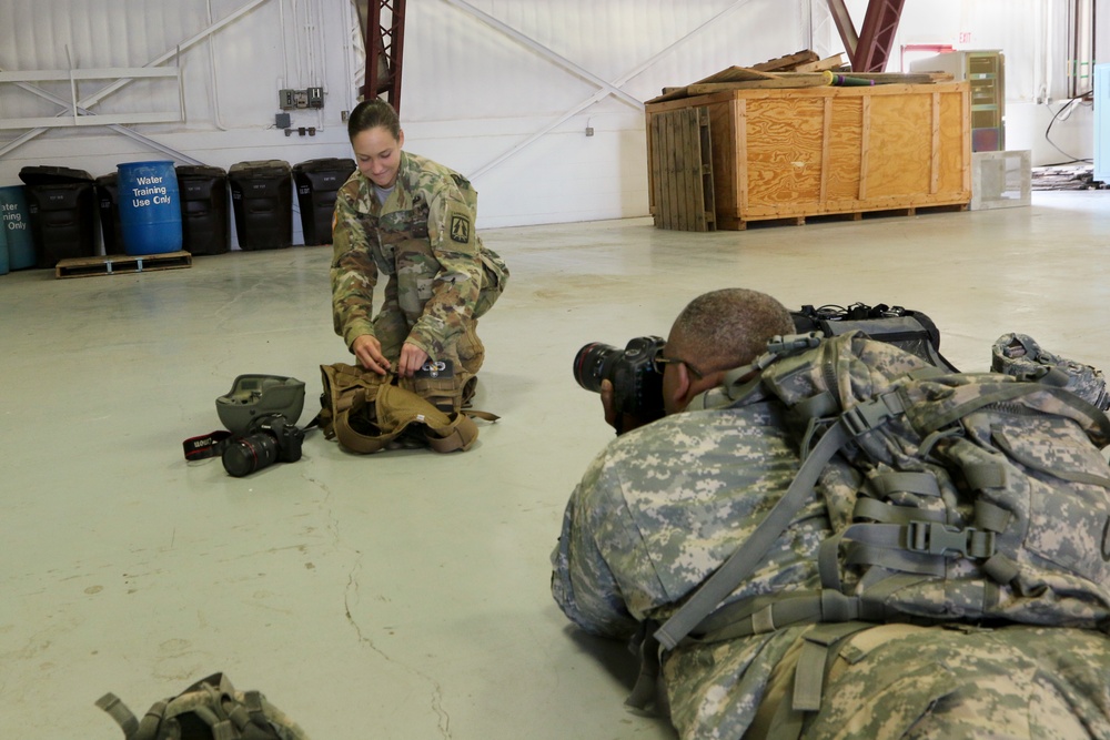 Soldier Prepares harness before boarding CH47 Chinook