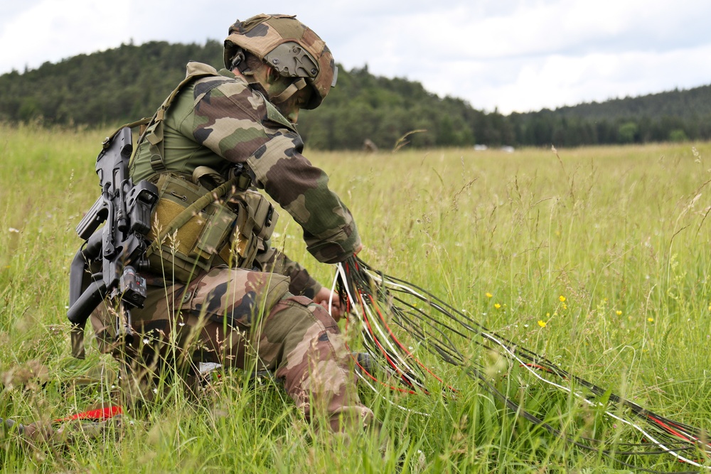 French Paratrooper recovers parachute