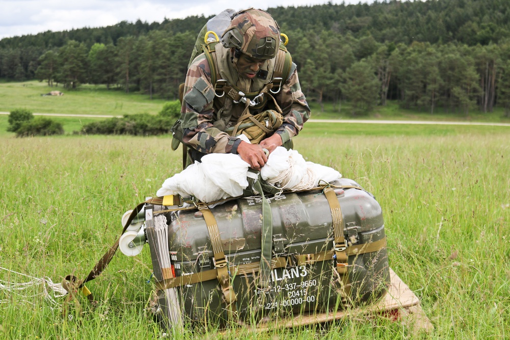 French Paratrooper recovers equipment