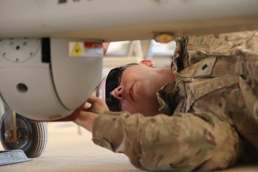 U.S. Soldiers prepare UAV for flight