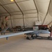 U.S. Soldiers prepare UAV for flight