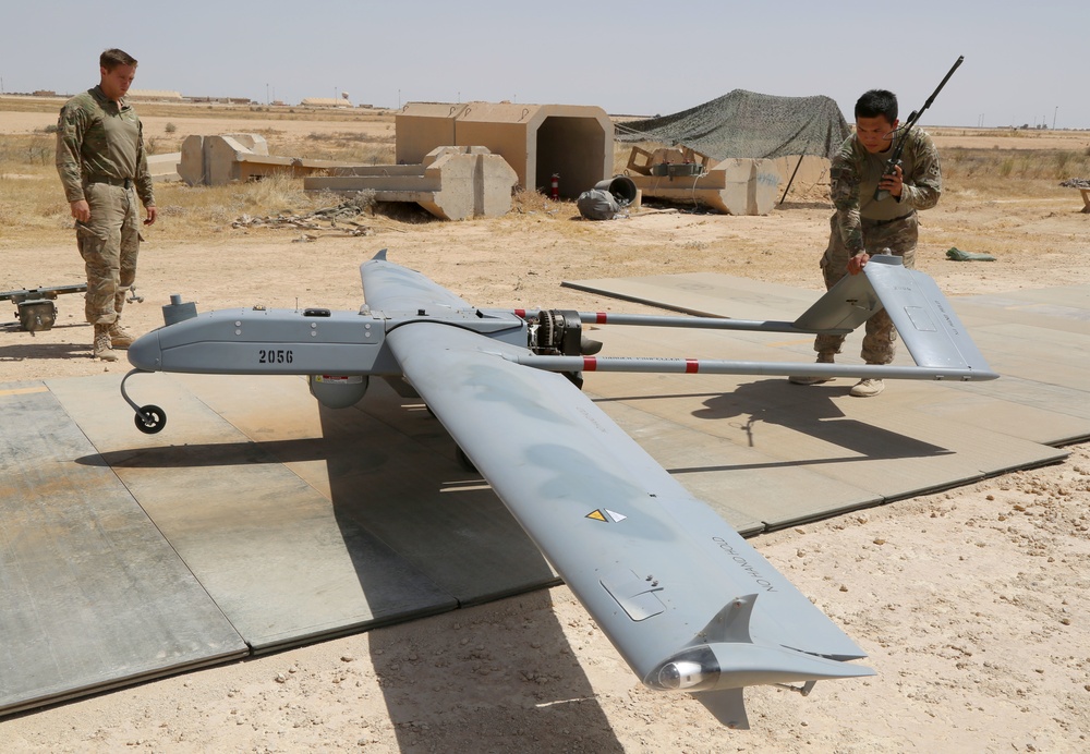 U.S. Soldiers prepare UAV for flight