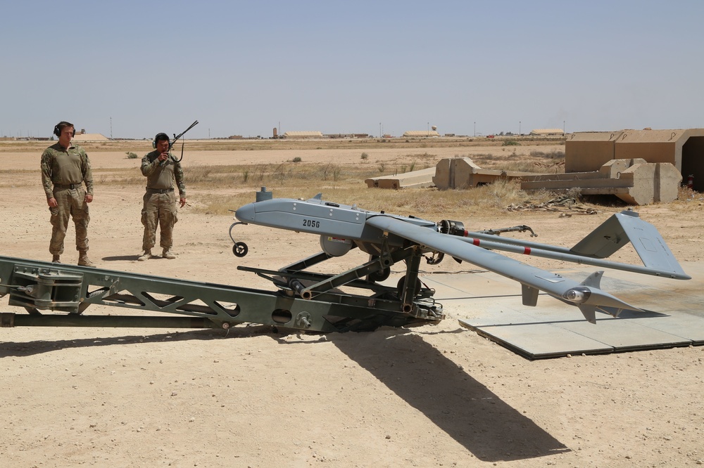 U.S. Soldiers prepare UAV for flight