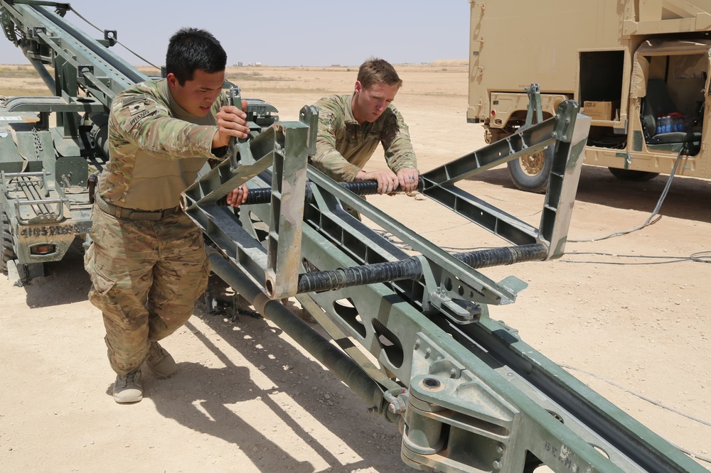 U.S. Soldiers prepare UAV for flight