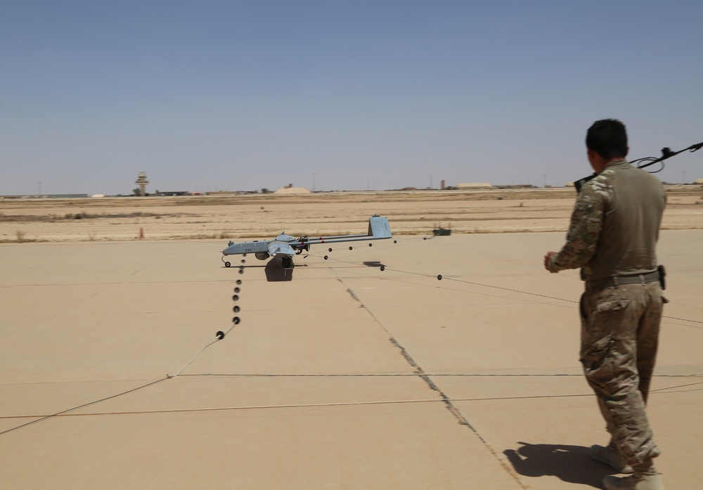 U.S. Soldiers prepare UAV for flight