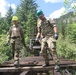 Danish Engineer Corps builds foot bridge within Black Hills