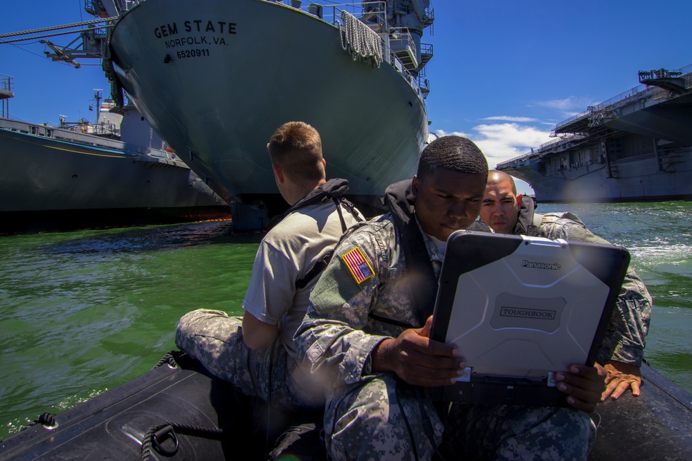 Soldiers scan sea floor