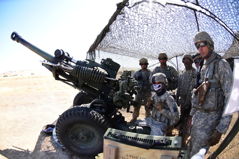 Hawaii Army National Guard Field Artillery Battalion conduct live fire operations