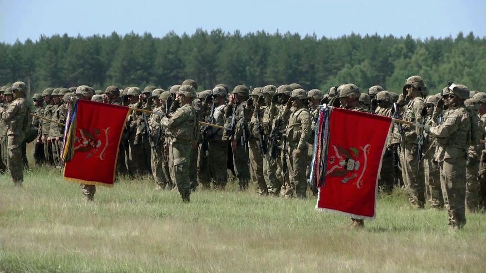 U.S. Troops Render Honors During Polish National Anthem