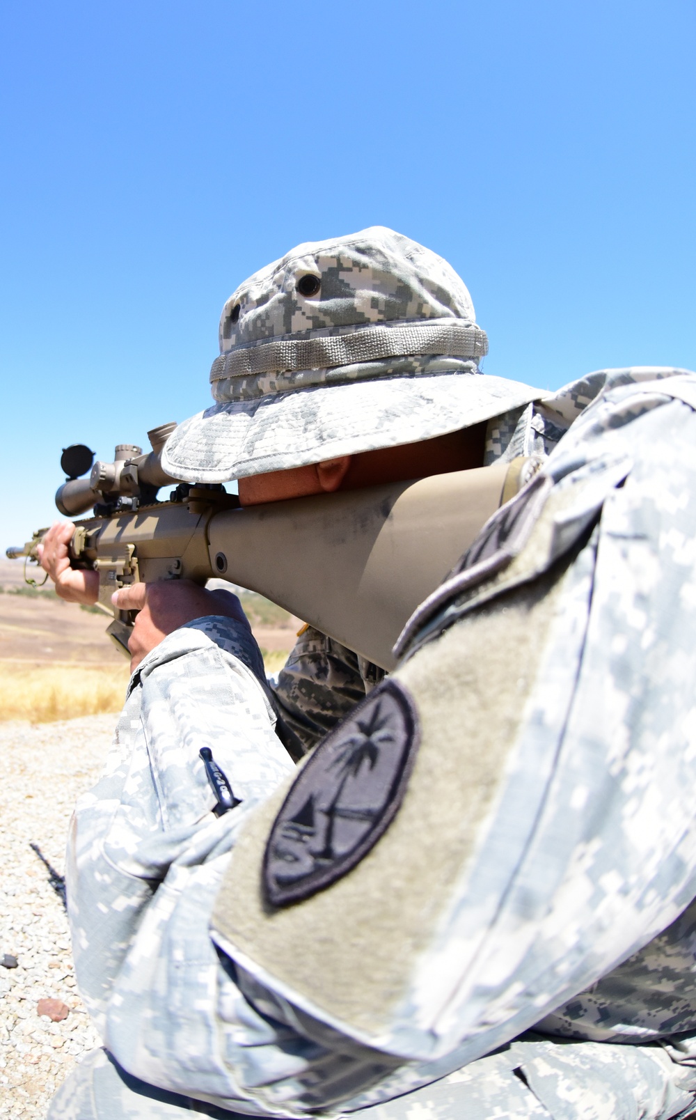 Guam Army National Guard snipers focus down range during XCTC 2016