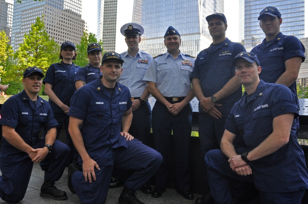 Petty Officer Robert McNeill and members of the Sector New York Incident Management Division gather at the 9/11 Memorial during his re-enlistment ceremony May 22, 2016.