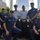 Petty Officer Robert McNeill and members of the Sector New York Incident Management Division gather at the 9/11 Memorial during his re-enlistment ceremony May 22, 2016.