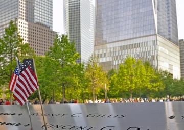 Petty Officer Robert McNeill honored deceased member Vincent Danz during his re-enlistment ceremony May 22, 2016.