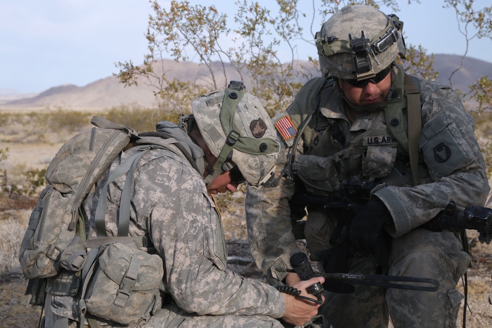 U.S. Army Soldiers Repair Radio
