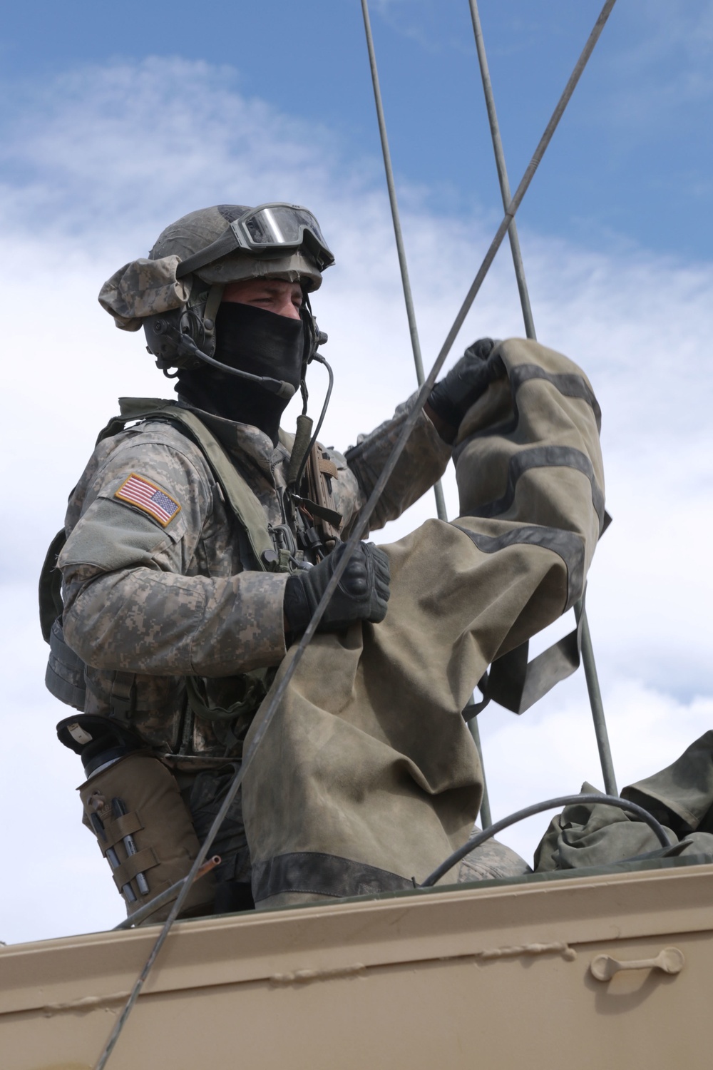 U.S. Army Soldier Sets Up Radio