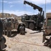 U.S. Army Soldiers Repair Vehicle