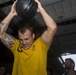 U.S. and Australian forces compete in team fitness challenge aboard HMAS Adelaide