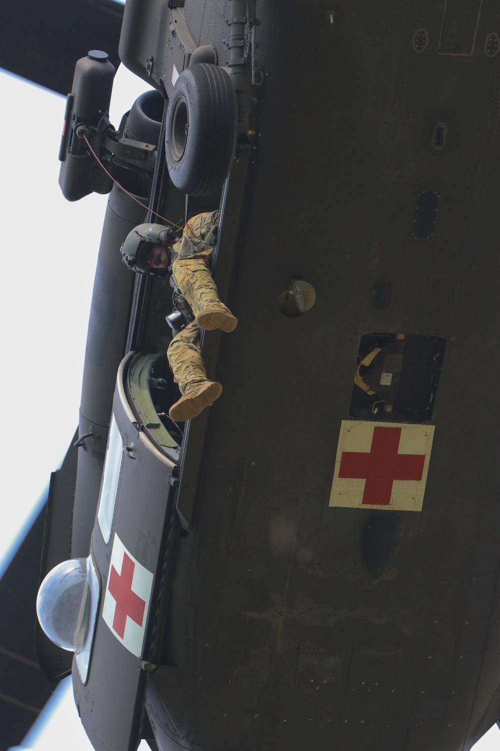 Flight medic prepares for a patient hoist
