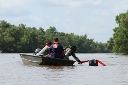 La. Guardsmen train with Coast Guard on water rescues