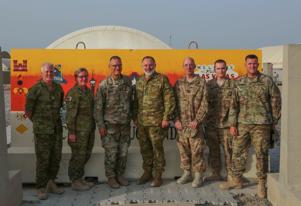 Anglican Bishop to the Australian Defense Force poses with US Army Chaplains