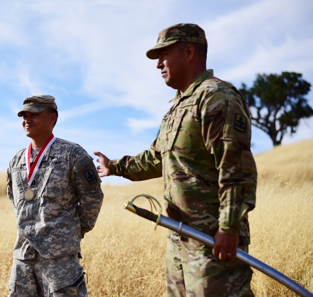 299th Cavalry Regiment inducts a fellow Soldier into Knighthood during XCTC 2016