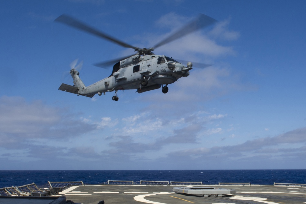 MH-60R Seahawk helicopter takes off from the flight deck USS Princeton (CG 59)