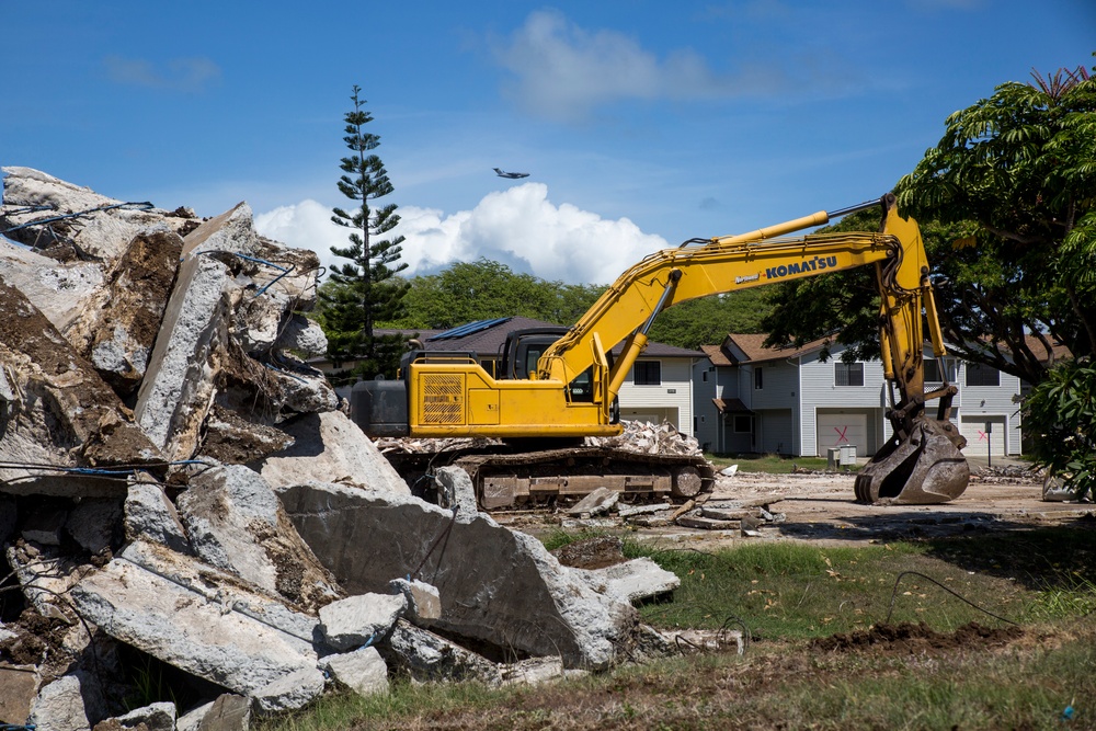 Tearing down buildings, raising up homes