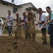 Tearing down buildings, raising up homes