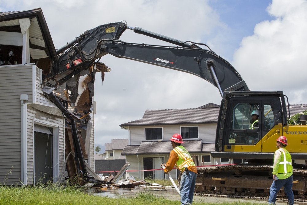 Tearing down buildings, raising up homes