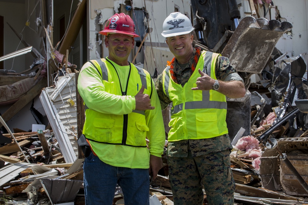 Tearing down buildings, raising up homes