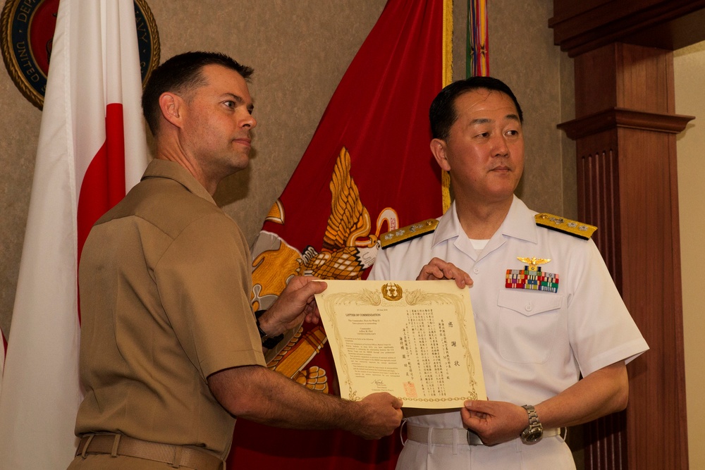 US Marine and Sailor receive letter of appreciation from JMSDF