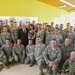 Group Photo of MN Gov Mark Dayton with Troops During HCA Project