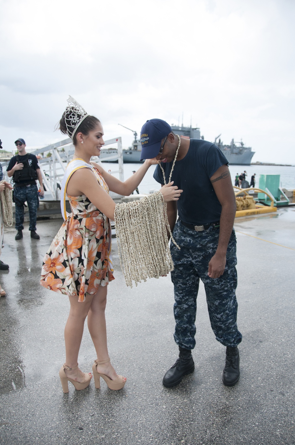 Miss Guam World welcomes USS Topeka Sailor with shell lei