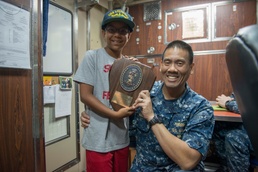 USS Louisiana Gives Tour to 'Boy of the Year'