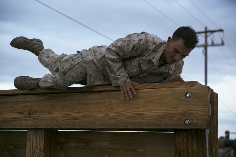 HQSC 7th Marine Regiment tackles obstacle course