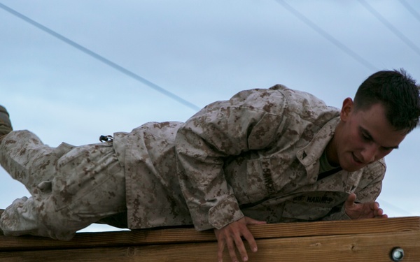 HQSC 7th Marine Regiment tackles obstacle course
