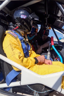 Military Child of the Year, driver meet for laps around track