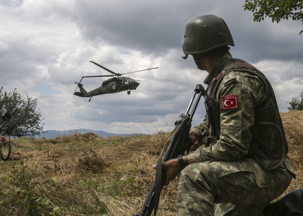 Turkish soldiers and Serbian Armed Forces conduct more than just a routine patrol