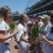 Ball Girls Hand Roses to Gold Star Family