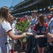 Ball Girls Hand Roses to Gold Star Family