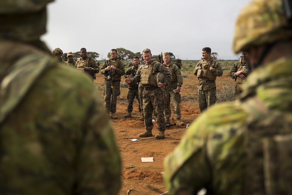 Marines and Australian soldiers move to objective